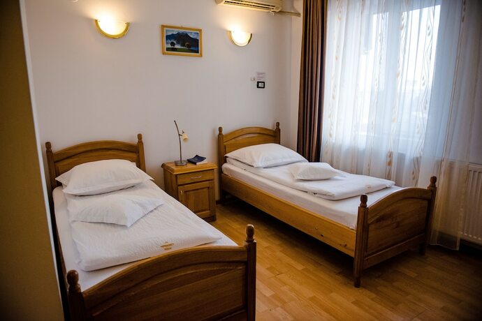 Imagen de la habitación del Hotel Pensiune Roua. Foto 15