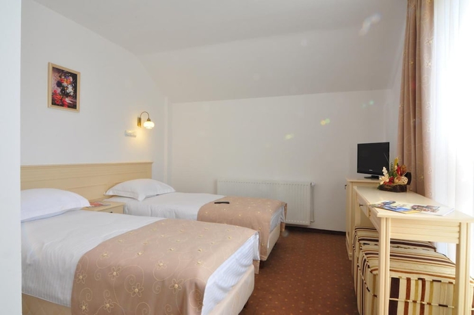 Imagen de la habitación del Hotel Pensiunea Casa Humor. Foto 2