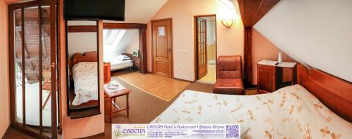 Imagen de la habitación del Hotel Pensiunea Crocus - Sauna & Billiard. Foto 6