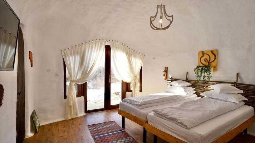 Imagen de la habitación del Hotel Pensiunea Dealul Verde. Foto 2