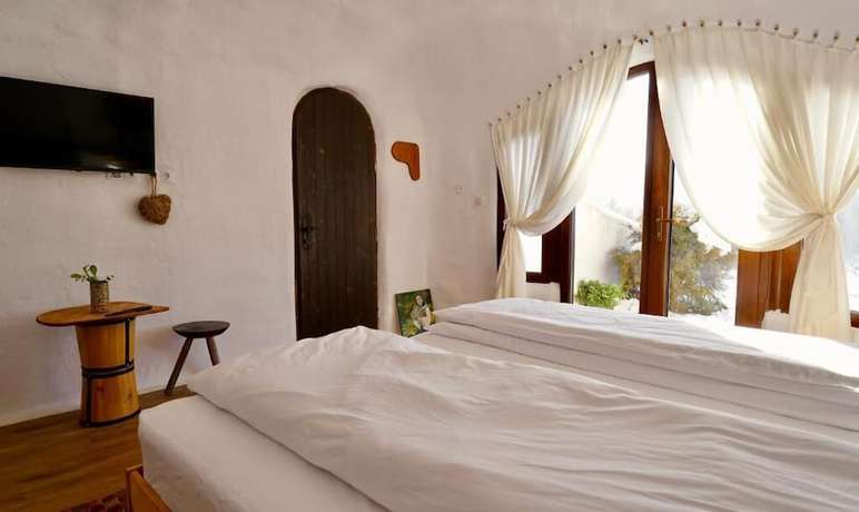 Imagen de la habitación del Hotel Pensiunea Dealul Verde. Foto 4