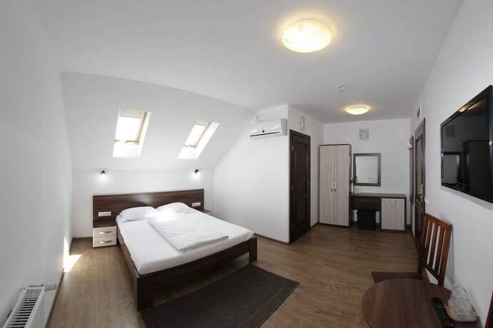 Imagen de la habitación del Hotel Pensiunea Denim. Foto 15