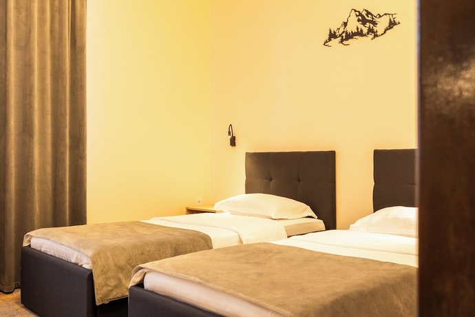Imagen de la habitación del Hotel Pensiunea Floarea Soarelui Brasov. Foto 14
