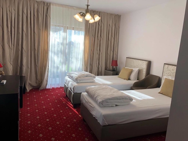 Imagen de la habitación del Hotel Pensiunea Genesa. Foto 3