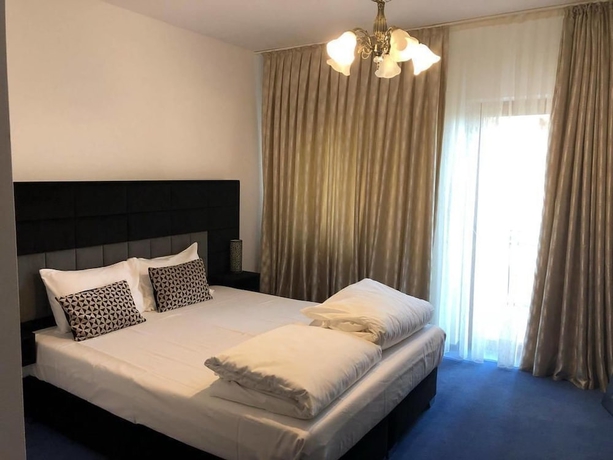 Imagen de la habitación del Hotel Pensiunea Genesa. Foto 5