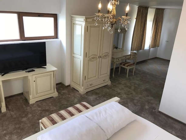 Imagen de la habitación del Hotel Pensiunea Genesa. Foto 8