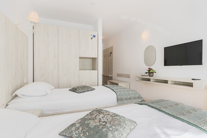 Imagen de la habitación del Hotel Pensiunea Hilltop. Foto 3