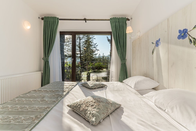 Imagen de la habitación del Hotel Pensiunea Hilltop. Foto 4
