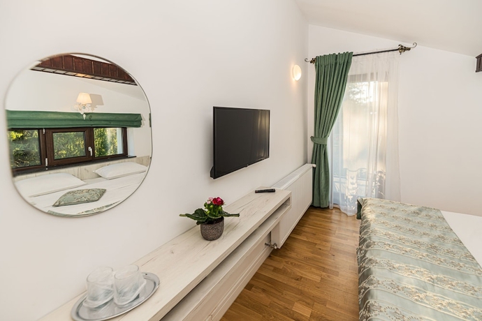 Imagen de la habitación del Hotel Pensiunea Hilltop. Foto 5