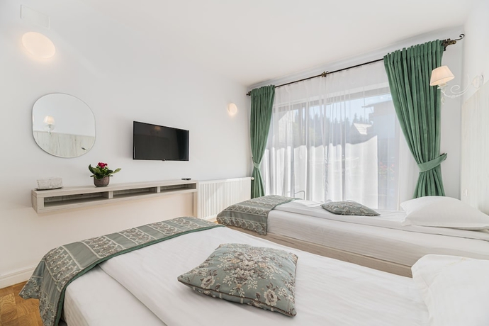 Imagen de la habitación del Hotel Pensiunea Hilltop. Foto 6