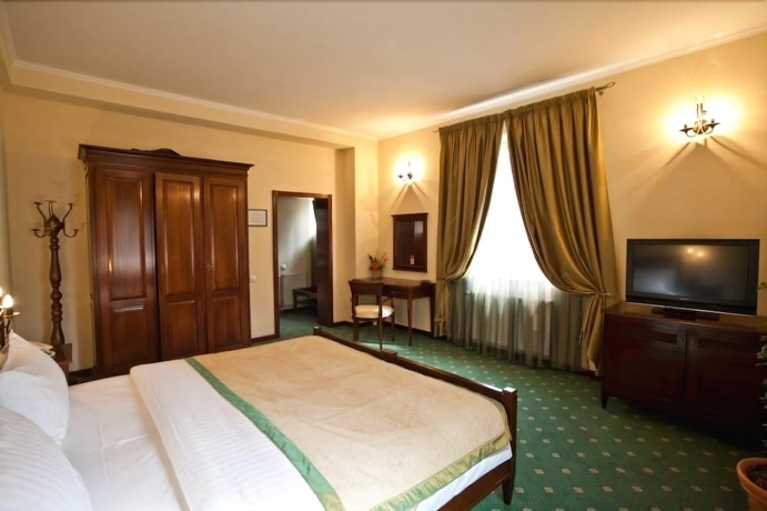 Imagen de la habitación del Hotel Pensiunea La Residenza. Foto 6