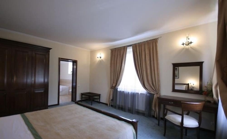 Imagen de la habitación del Hotel Pensiunea La Residenza. Foto 9