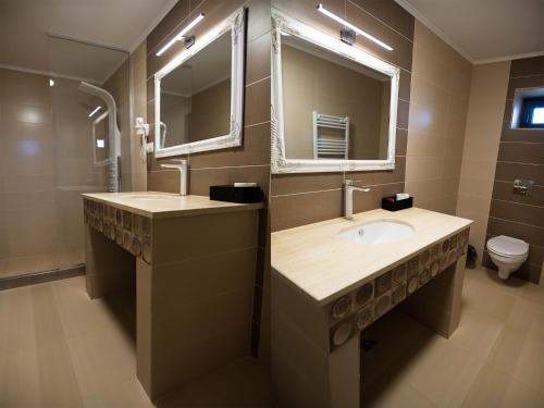 Imagen de la habitación del Hotel Pensiunea La Vie. Foto 9