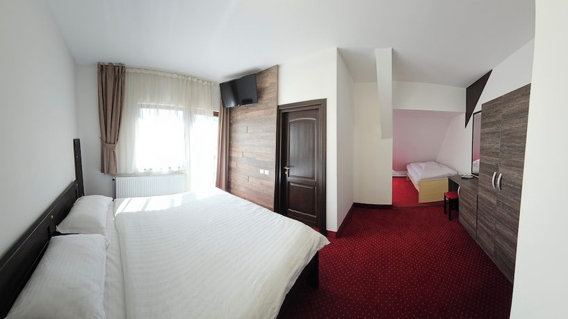 Imagen de la habitación del Hotel Pensiunea Miruna. Foto 3