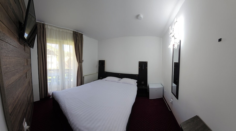Imagen de la habitación del Hotel Pensiunea Miruna. Foto 6
