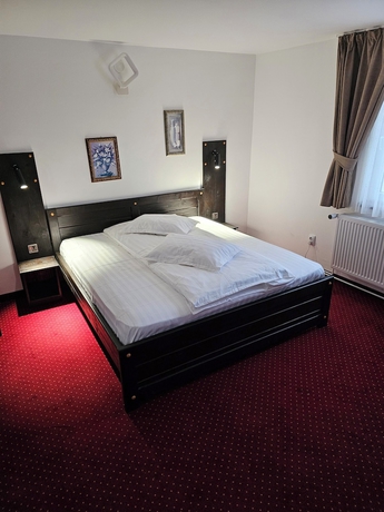 Imagen de la habitación del Hotel Pensiunea Miruna. Foto 7