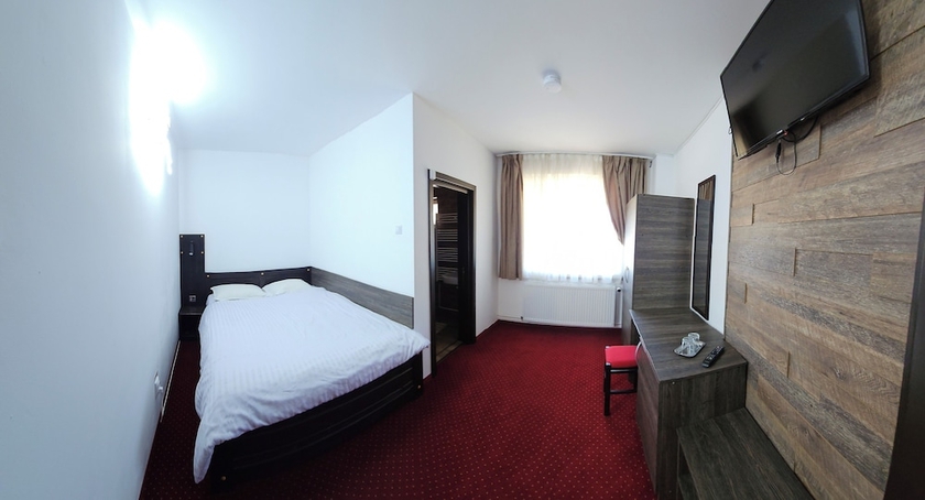 Imagen de la habitación del Hotel Pensiunea Miruna. Foto 8