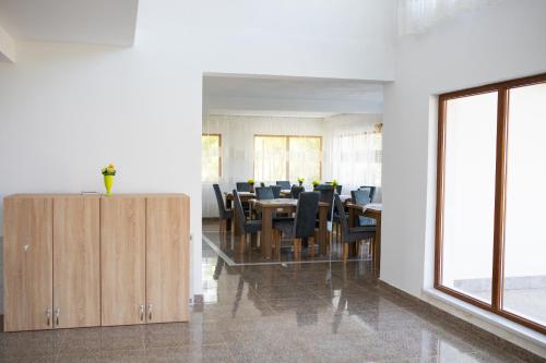 Imagen de la habitación del Hotel Pensiunea Paradiso Sarinasuf. Foto 19