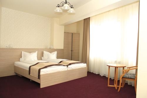 Imagen de la habitación del Hotel Pensiunea Rix Rooms. Foto 6