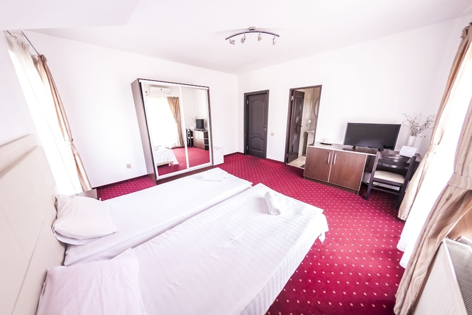 Imagen de la habitación del Hotel Pensiunea Schwartz. Foto 8