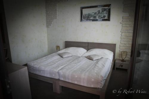 Imagen de la habitación del Hotel Pensiunea Vlahia Inn. Foto 6
