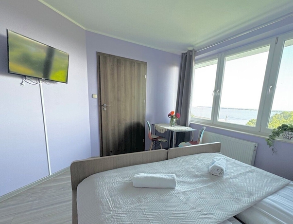 Imagen de la habitación del Hotel Pensjonat Błękitna Przystań. Foto 6