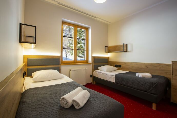 Imagen de la habitación del Hotel Pensjonat Puchacz&oacute;wka. Foto 12