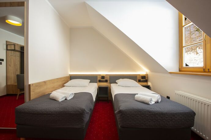 Imagen de la habitación del Hotel Pensjonat Puchacz&oacute;wka. Foto 18