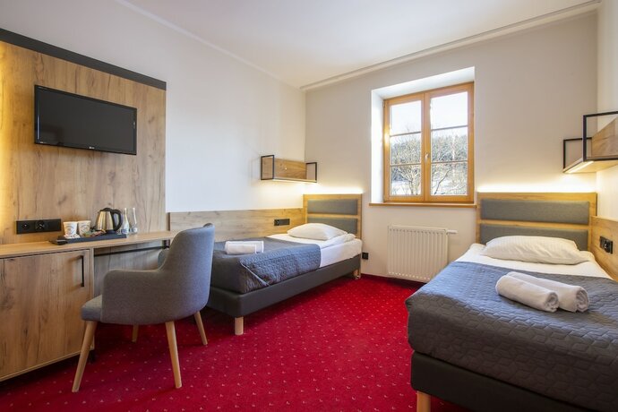 Imagen de la habitación del Hotel Pensjonat Puchacz&oacute;wka. Foto 19