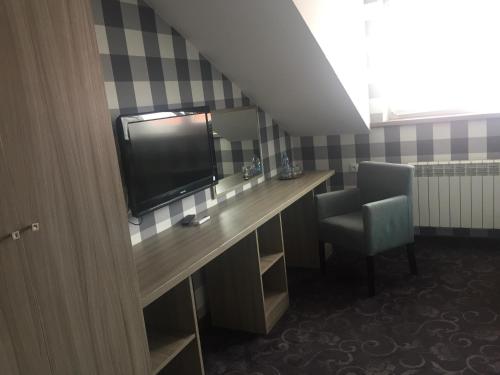 Imagen de la habitación del Hotel Pensjonat Retro. Foto 7