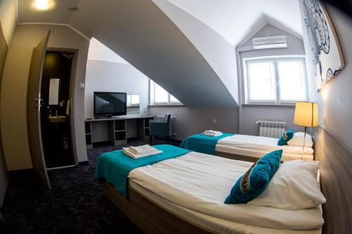 Imagen de la habitación del Hotel Pensjonat Retro. Foto 8