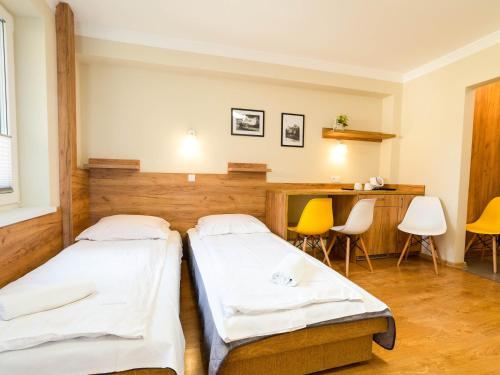 Imagen de la habitación del Hotel Pensjonat Szczepaniak&oacute;wka. Foto 13