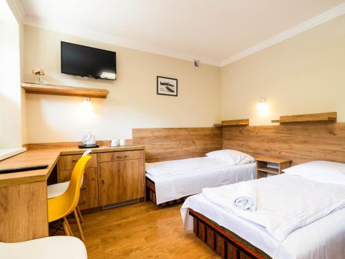 Imagen de la habitación del Hotel Pensjonat Szczepaniak&oacute;wka. Foto 14