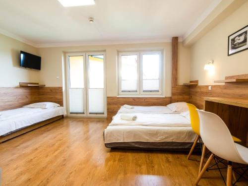 Imagen de la habitación del Hotel Pensjonat Szczepaniak&oacute;wka. Foto 15