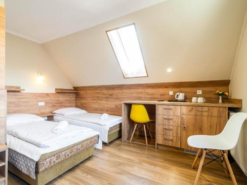 Imagen de la habitación del Hotel Pensjonat Szczepaniak&oacute;wka. Foto 16