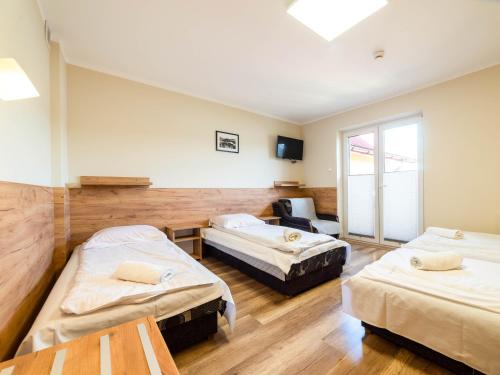 Imagen de la habitación del Hotel Pensjonat Szczepaniak&oacute;wka. Foto 17