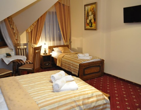 Imagen de la habitación del Hotel Pensjonat Zb&oacute;jecki Dw&oacute;r. Foto 15
