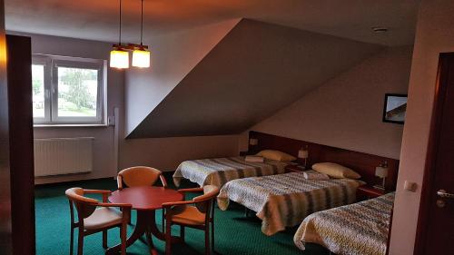 Imagen de la habitación del Hotel Pensjonat u Marianny. Foto 9