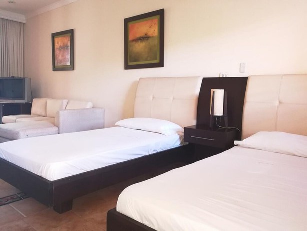 Imagen de la habitación del Hotel Pe&ntilde;on Suites. Foto 2