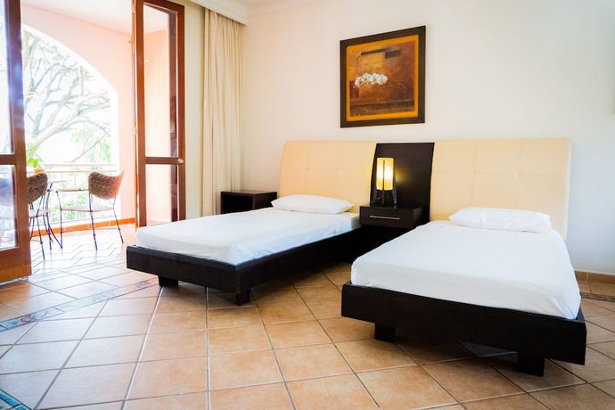 Imagen de la habitación del Hotel Pe&ntilde;on Suites. Foto 10