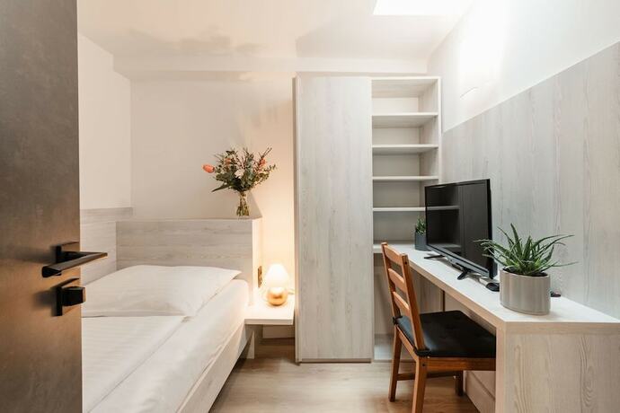 Imagen de la habitación del Hotel Penzion Austis. Foto 18