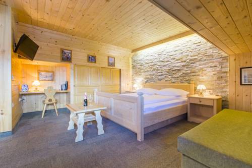 Imagen de la habitación del Hotel Penzion Berc. Foto 12