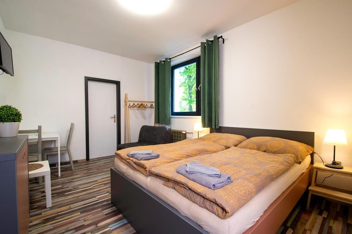 Imagen de la habitación del Hotel Penzion D&iacute;lna. Foto 16