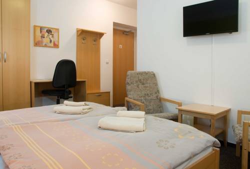 Imagen de la habitación del Hotel Penzion Maxim. Foto 3