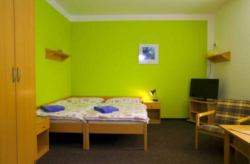 Imagen de la habitación del Hotel Penzion Maxim. Foto 4