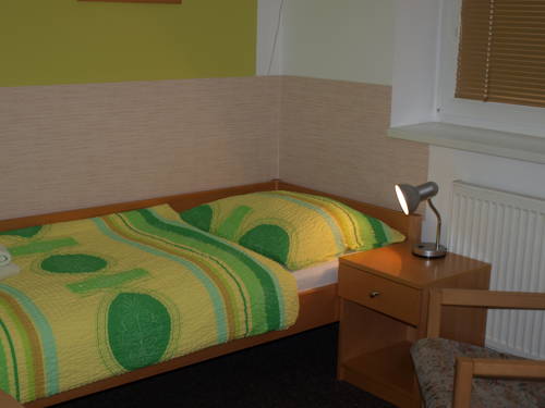 Imagen de la habitación del Hotel Penzion Maxim. Foto 11