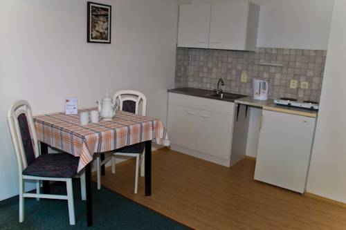 Imagen de la habitación del Hotel Penzion Revis. Foto 4