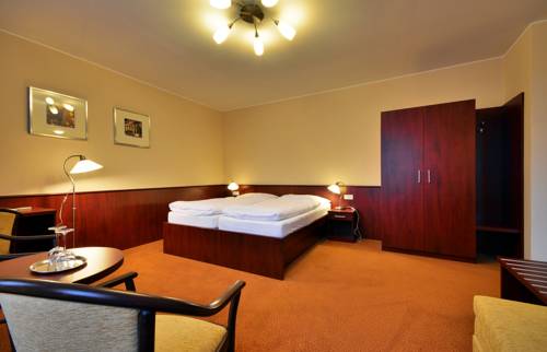 Imagen de la habitación del Hotel Penzion Siesta. Foto 11