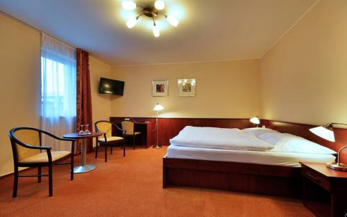 Imagen de la habitación del Hotel Penzion Siesta. Foto 14