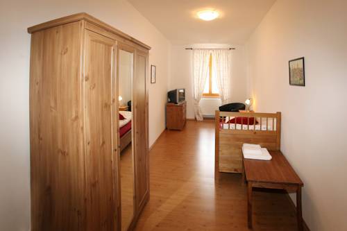 Imagen de la habitación del Hotel Penzion U Chodsk&eacute;ho Hradu. Foto 7